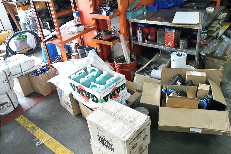 Store room stacked with boxes of spares and consumables